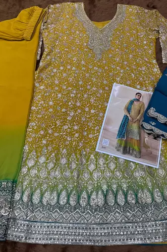 Yellow pure geogette full stitched suit free size upto 42