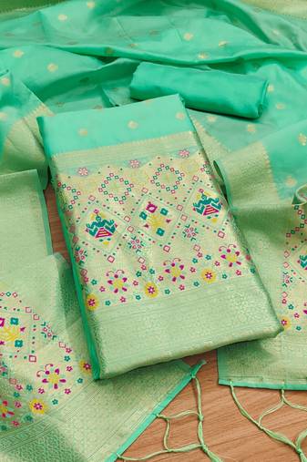 Sea green soft banarasi silk pure zari woven design dress material
