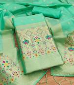 Sea green soft banarasi silk pure zari woven design dress material