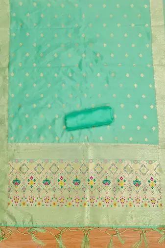 Sea green soft silk blend silk pure zari woven dress material