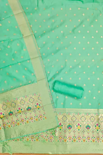 Sea green soft silk blend silk pure zari woven dress material
