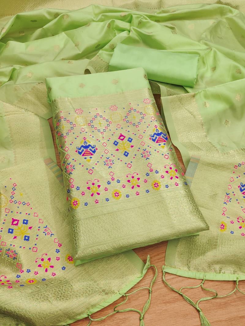 Pista soft banarasi silk pure zari woven design dress material