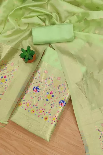 Pista soft banarasi silk pure zari woven design dress material