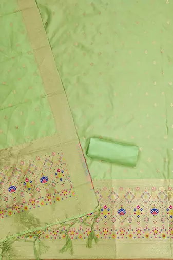 Pista soft banarasi silk pure zari woven design dress material