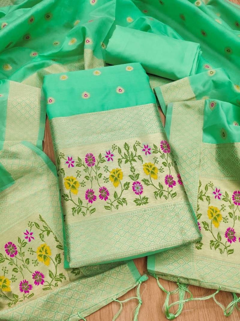 Sea green soft banarasi silk pure zari woven design dress material