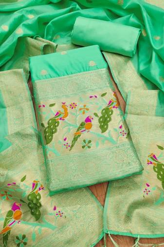 Sea green soft banarasi silk pure zari woven design dress material
