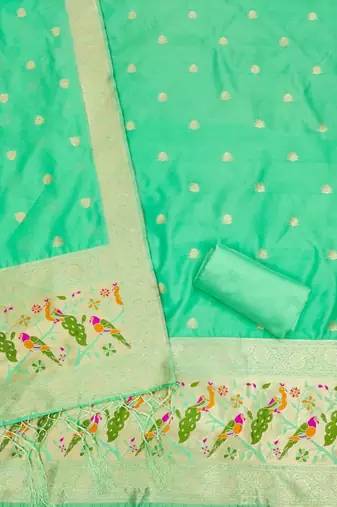Sea green soft silk blend silk pure zari woven dress material