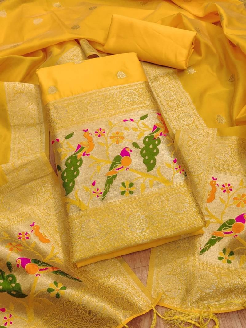 Yellow soft banarasi silk pure zari woven design dress material