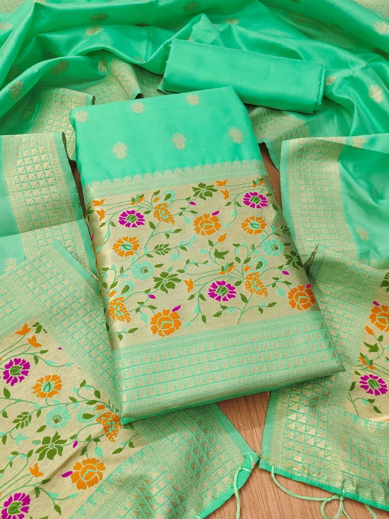 Sea green soft banarasi silk pure zari woven design dress material