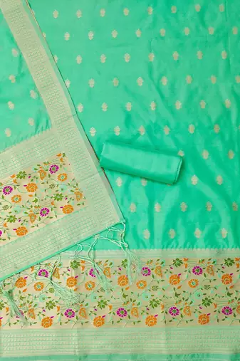 Sea green soft silk blend silk pure zari woven dress material