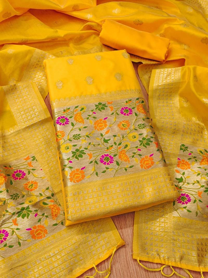 Yellow soft banarasi silk pure zari woven design dress material