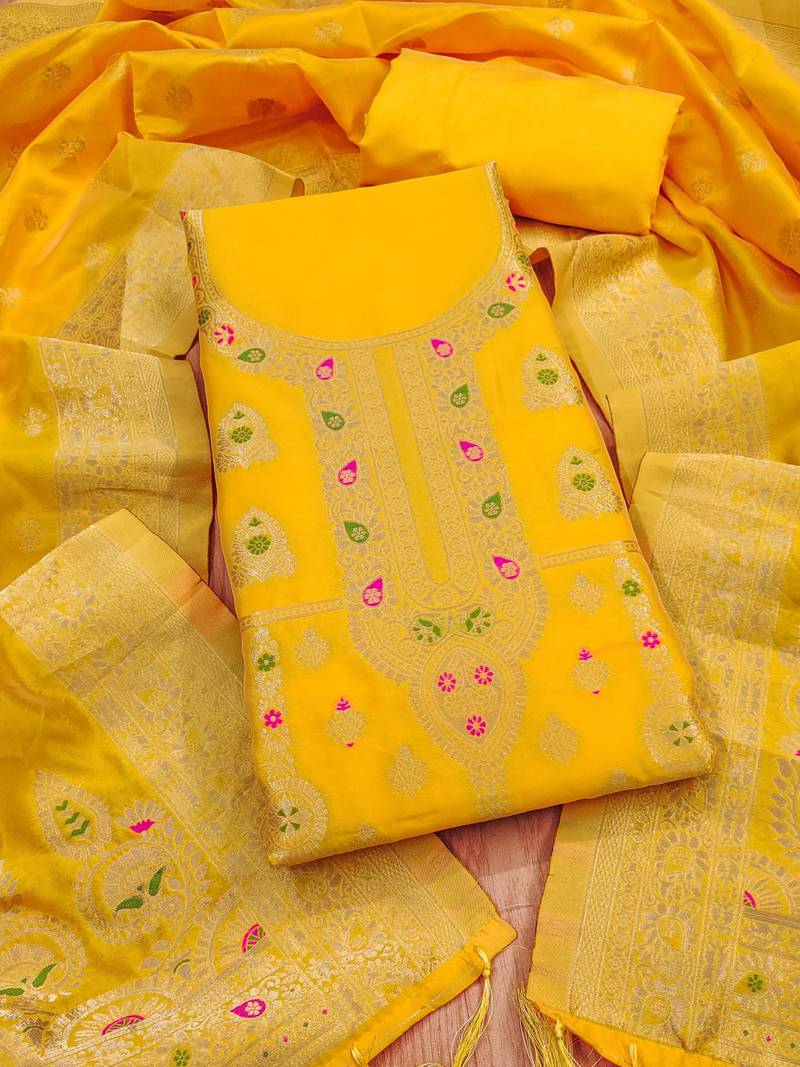 Yellow soft banarasi silk pure zari woven design dress material