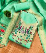 Sea green soft banarasi silk pure zari woven design dress material
