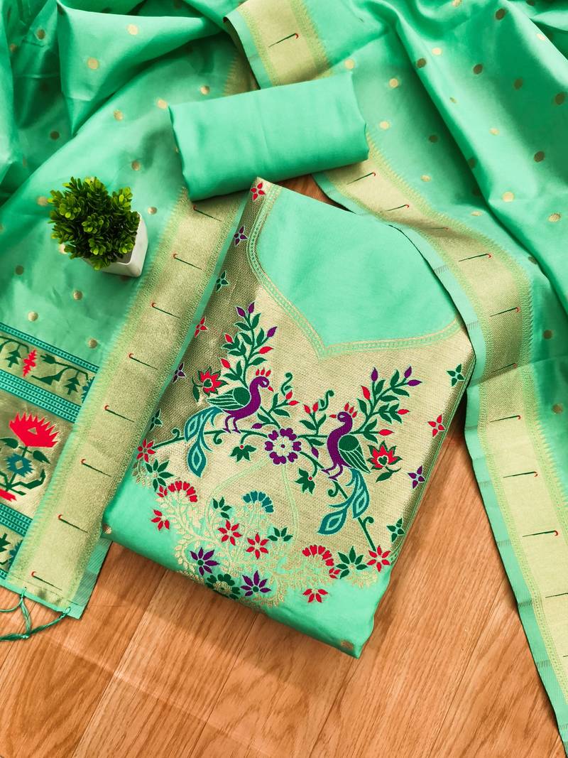 Sea green soft banarasi silk pure zari woven design dress material