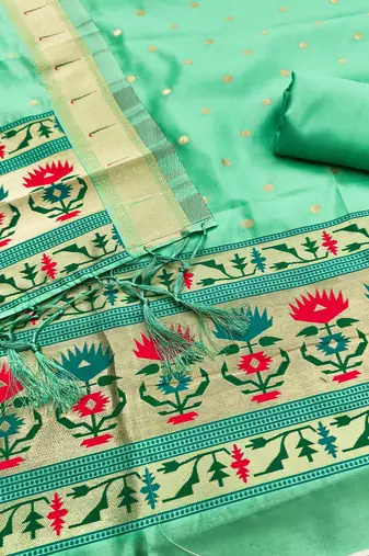 Sea green soft silk blend silk pure zari woven dress material