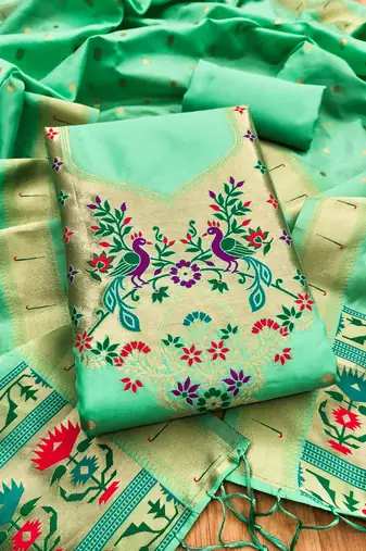 Sea green soft silk blend silk pure zari woven dress material