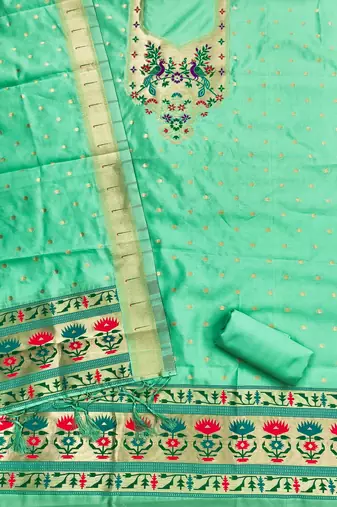 Sea green soft silk blend silk pure zari woven dress material
