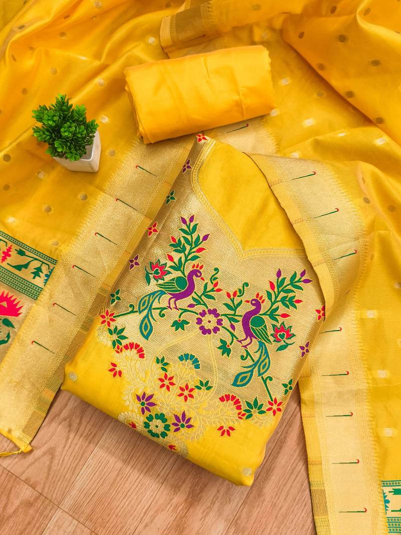 Yellow soft banarasi silk pure zari woven design dress material