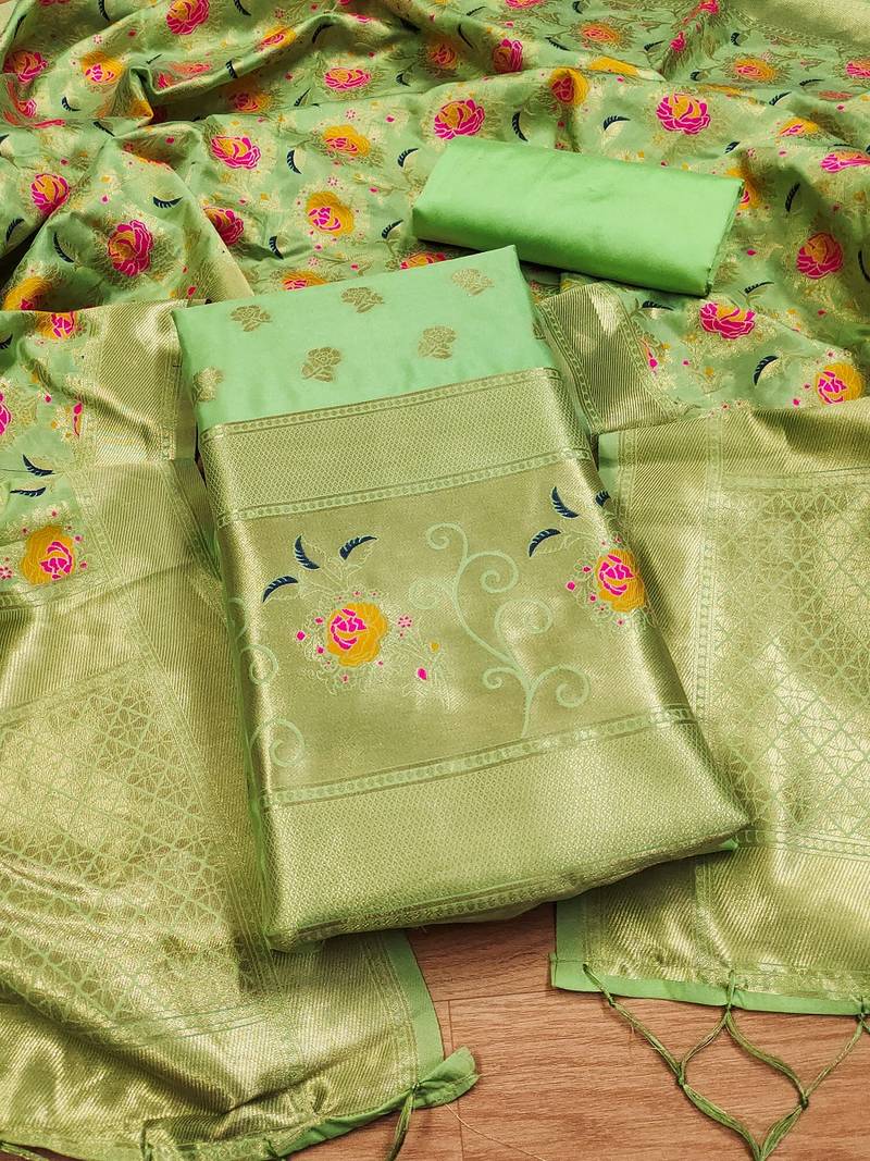 Pista soft banarasi silk pure zari woven design dress material