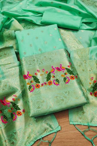Sea green soft banarasi silk pure zari woven design dress material