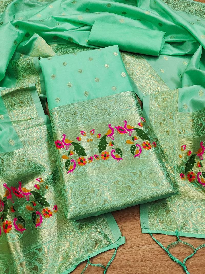 Sea green soft banarasi silk pure zari woven design dress material