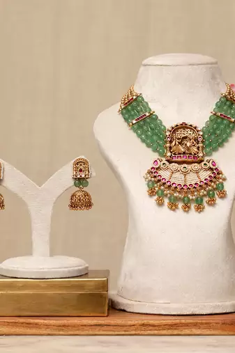 Gold plated kundan green stones necklace set