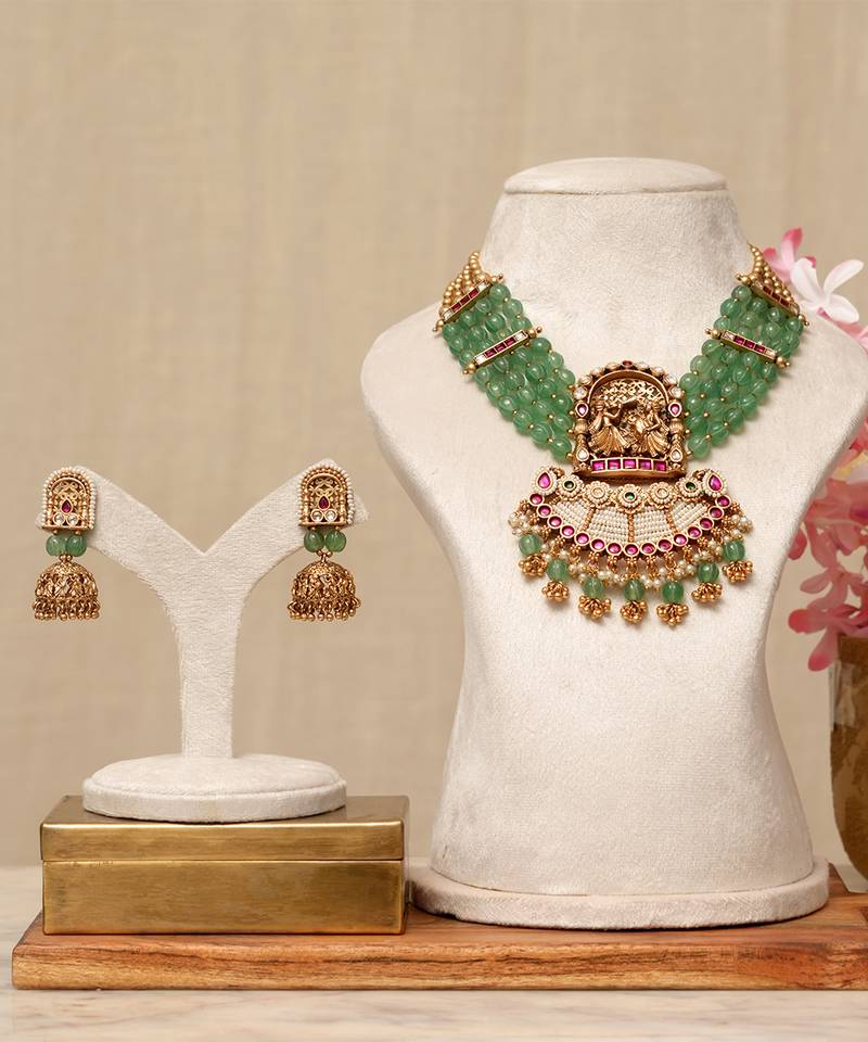 Gold plated kundan green stones necklace set
