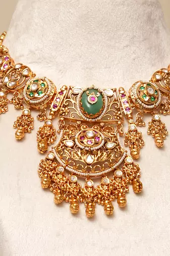 Gold plated kundan green stones necklace set