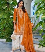 Orange chinon free size stitched plazzo suit with codding dori & sequence work