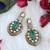 Green teardrop polki earrings