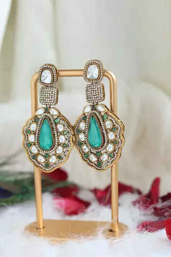 Green teardrop polki earrings