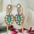 Green teardrop polki earrings