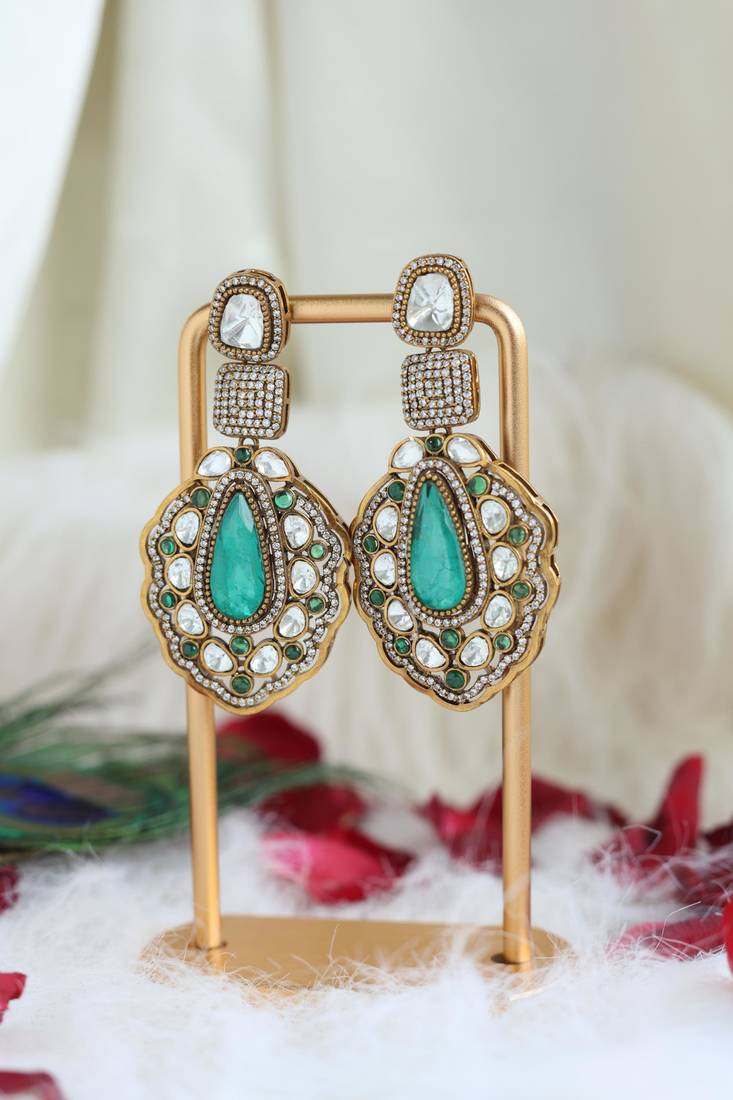 Green teardrop polki earrings