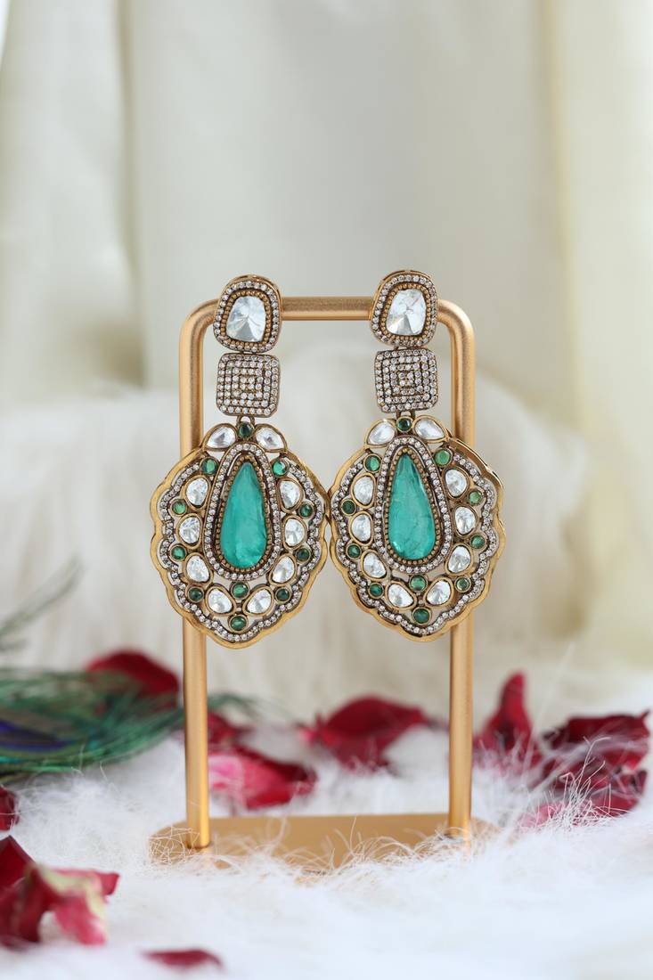 Green teardrop polki earrings