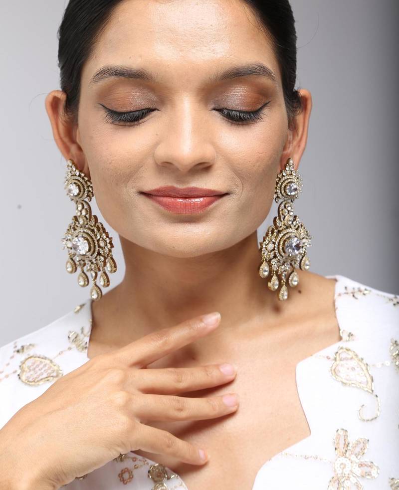 Gold tone crystal earrings