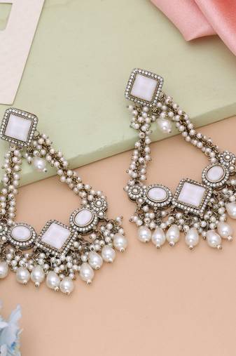 White color kundan earrings