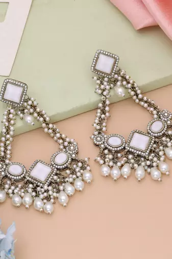 White color kundan earrings