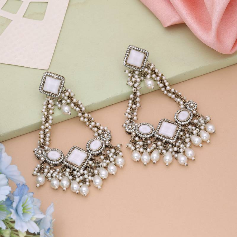 White color kundan earrings