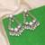 White color kundan earrings