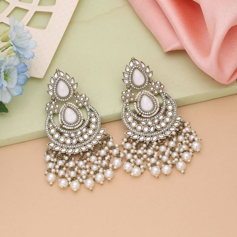 White color kundan earrings