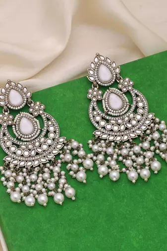 White color kundan earrings