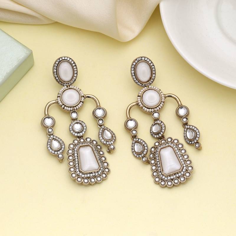 White color kundan earrings