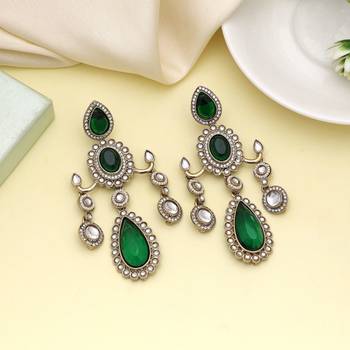 Green color kundan earrings 1