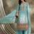 Saahmriga embroidered firozi chinon round neck flared sleeve kurta palazzo sets