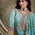 Saahmriga embroidered firozi chinon round neck flared sleeve kurta palazzo sets