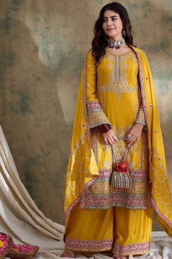 Saahmriga embroidered yellow chinon round neck flared sleeve kurta palazzo sets