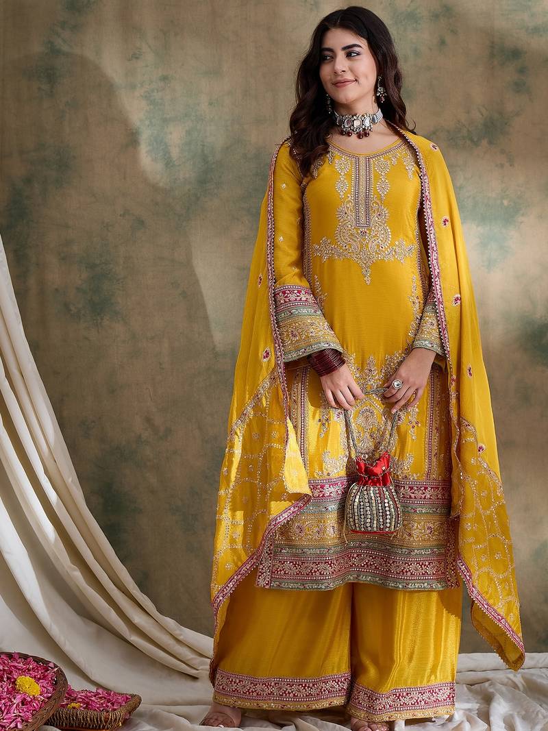 Saahmriga embroidered yellow chinon round neck flared sleeve kurta palazzo sets