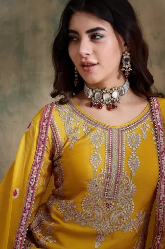  embroidered yellow chinon round neck flared sleeve kurta palazzo sets