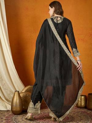 High-Fashion Black and Gold Silk Suit with Architectural Metallic Embroidery 2