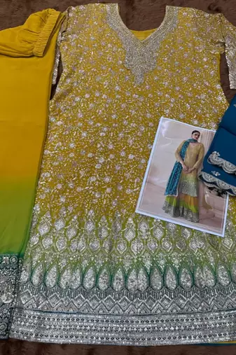 Yellow real georgette free size stitched suit with sequence & diamond work